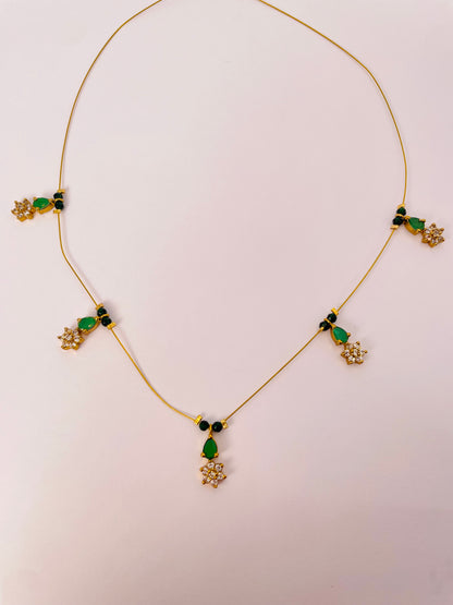 nyra-teal-gold-emerald-stone-flower-invisible-chain-necklace