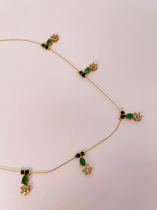 nyra-teal-gold-emerald-stone-flower-invisible-chain-necklace