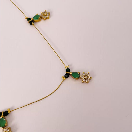 nyra-teal-gold-emerald-stone-flower-invisible-chain-necklace